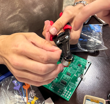 Cutting the battery off of the vape, allowing us to power the device ourselves.